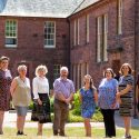 From left: Niomi Nichol, Health and Social Care Engagement Manager; Iona Callum, Programme Co-ordinator; Norma Austin Hart, Chief Executive Officer; John Dougan, TSDG Board Chair; Rachel Muir, Community Engagement Officer (Funding); Carol Bell, Hospital to Home Wraparound Coordinator; Claire Brown, Head of Operations; and Dan Allan, Information and Communications Officer.